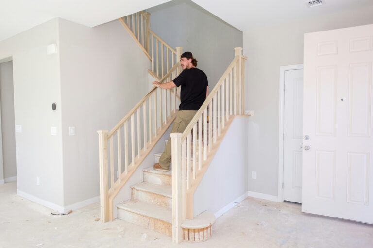 contractor walks up stairs